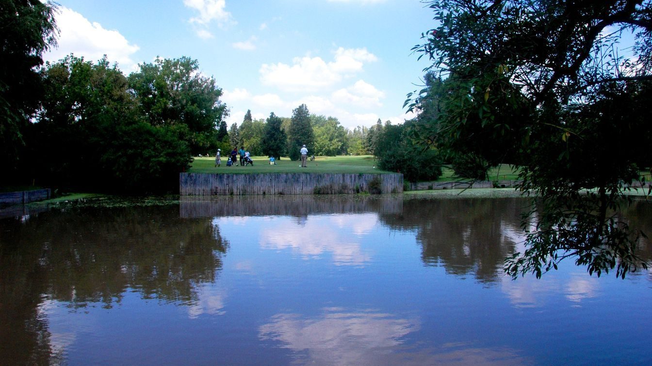 Approach to a green guarded by bunkers
